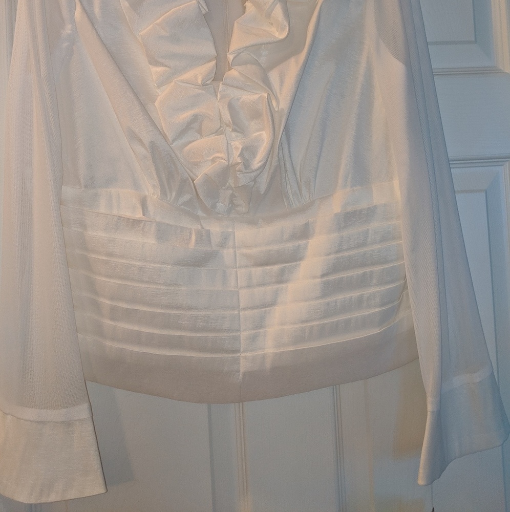 White satiny soft semi -formal blouse.